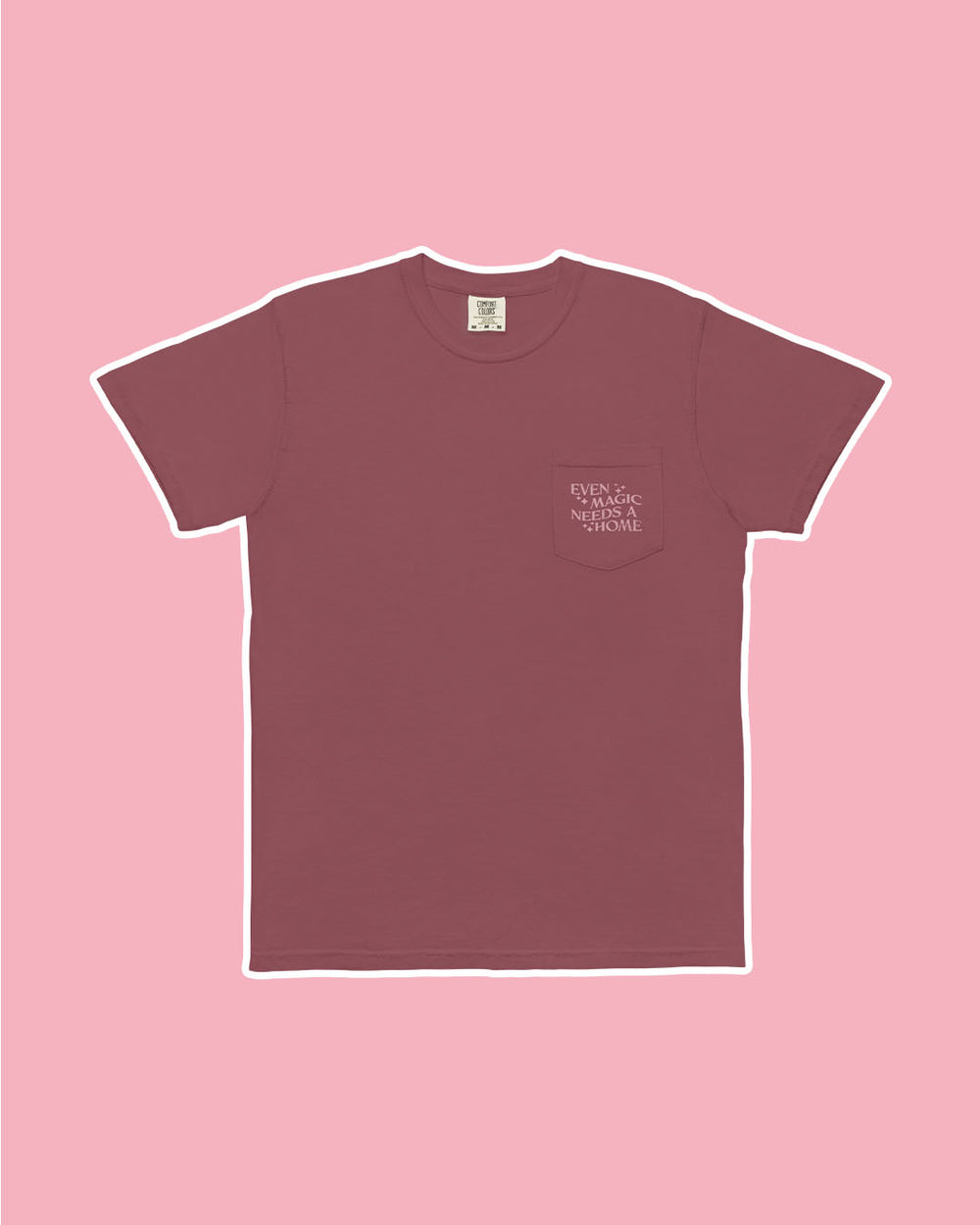 Front of the Witchery shirt with 'even magic needs a home' written on the pocket on the left chest embellished with star details.