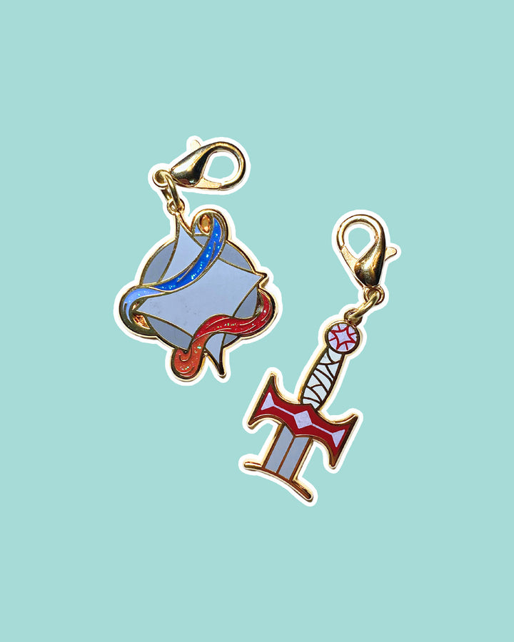 Legendborn charm set featuring the Legendborn symbol and Excalibur&