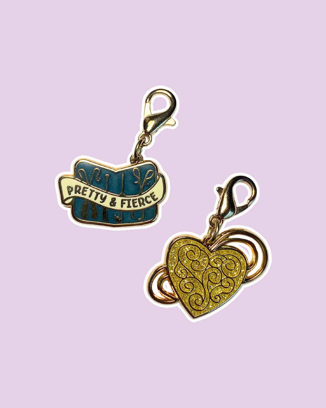 Stalking Jack the Ripper charm set featuring a 'pretty & fierce' with Audrey Rose's tool kit and another charm with her gold locket.
