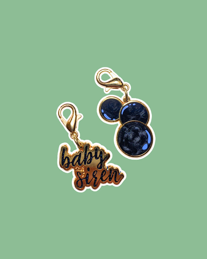 The Bargainer charm set featuring a gold &
