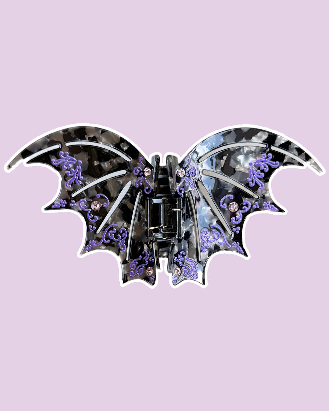 SJM hair clip in black and violet with gem embellishments inspired by the bat boys from A Court of Thorns and Roses by Sarah J. Maas. 