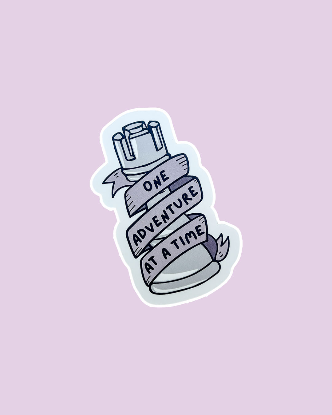 A Darker Shade of Magic stick for VE Schwab fans featuring a rook with a banner wrapped around it with the phrase 'One adventure at a time' written on it.