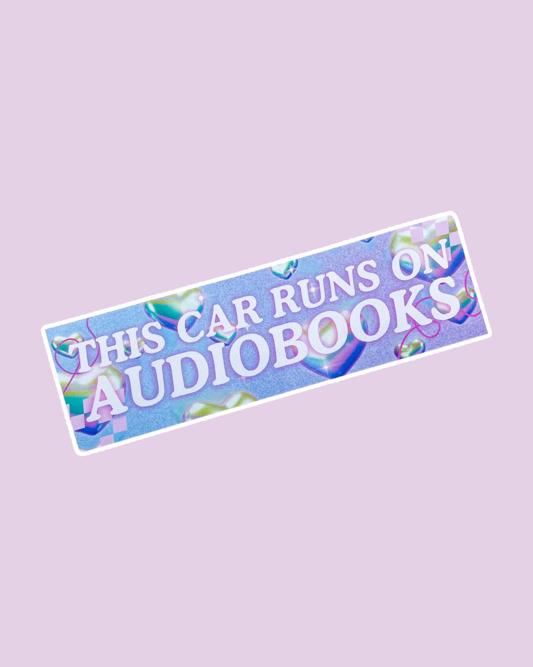 Audiobook bumper sticker for book lovers featuring the quote 'This car runs on audiobooks' in all caps.