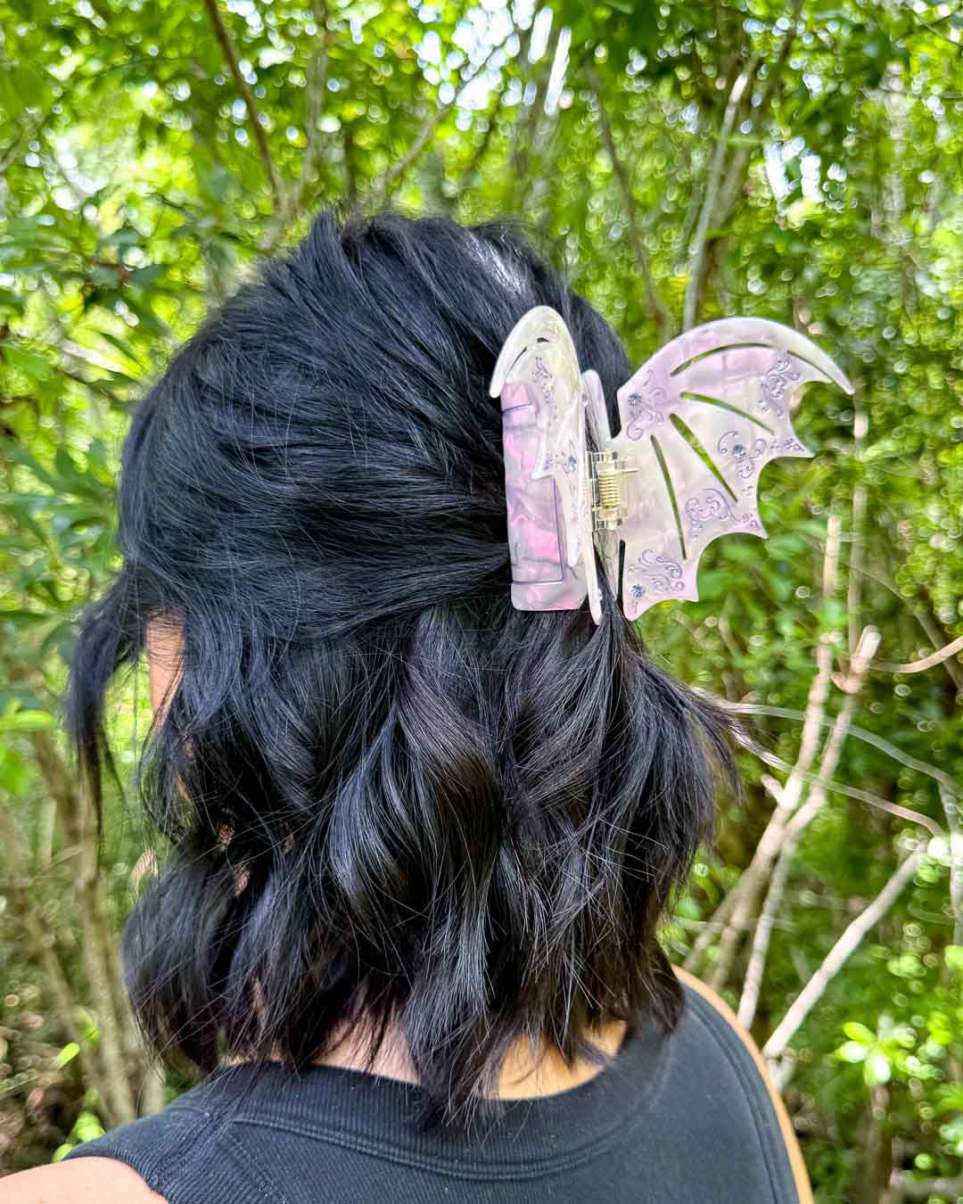 Pastel purple A Court of Thorns and Roses hair accessory with purple gem embellishments and pearlescent details.