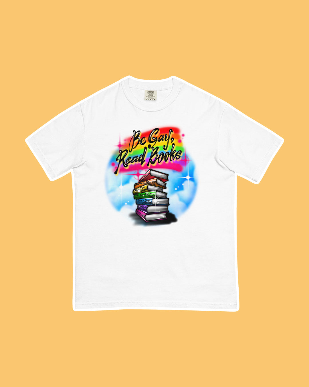 Bookish shirt for LGBTQ+ readers with the phrase 'Be gay, read books' with a rainbow stack of queer titles.
