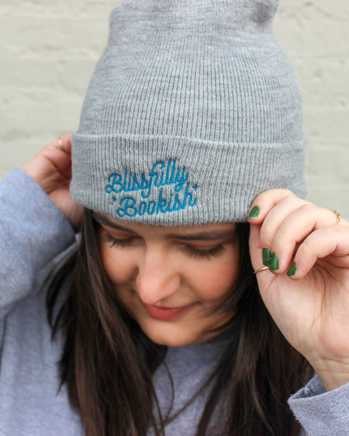 Embroidered beanie featuring a blue logo for Blissfully Bookish.
