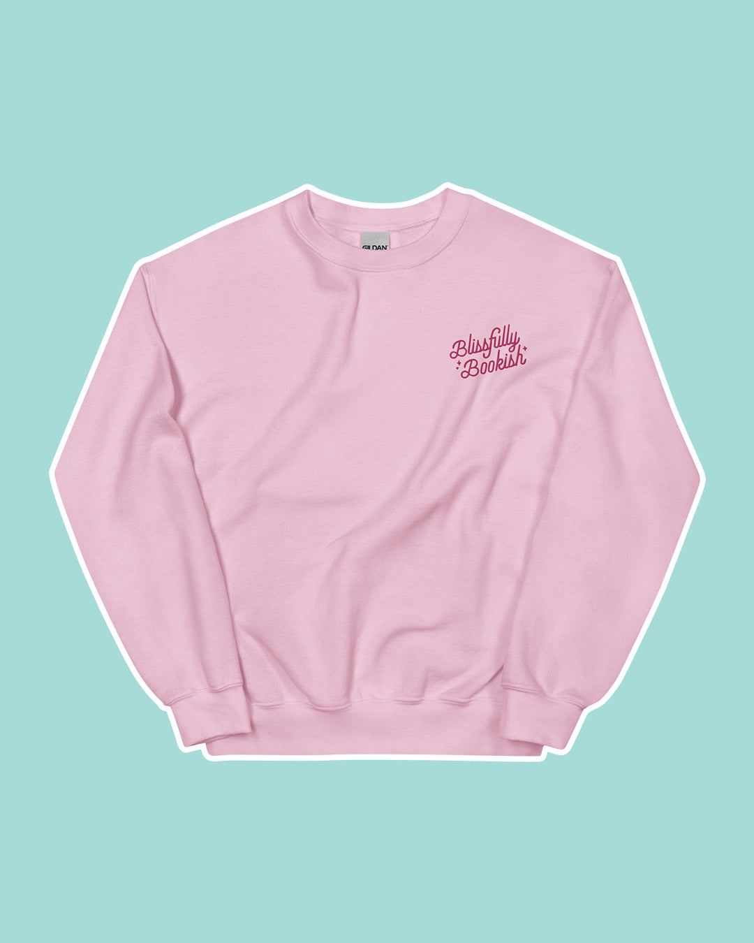Pink sweatshirt with the Blissfully Bookish logo embroidered on the left chest.
