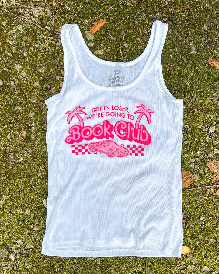 Y2k bookish shirt featuring an illustrated car, a finish line, and palm trees with the line &