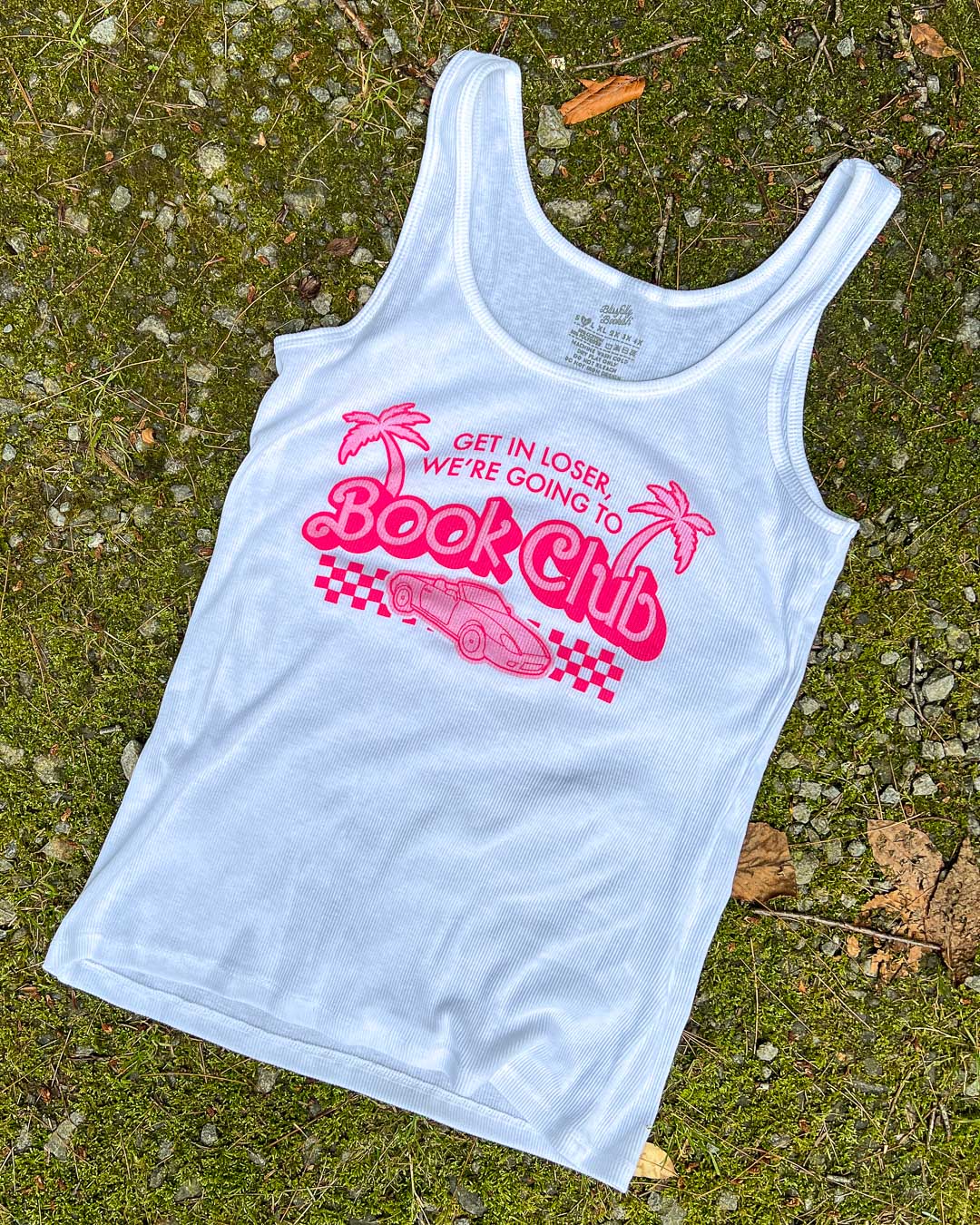 Book club shirt featuring a pink design with the quote &