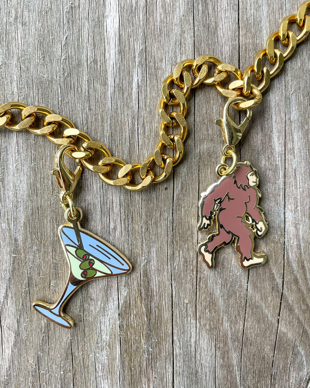 Emily Henry charms for Book Lovers fans featuring Bigfoot and a martini glass.