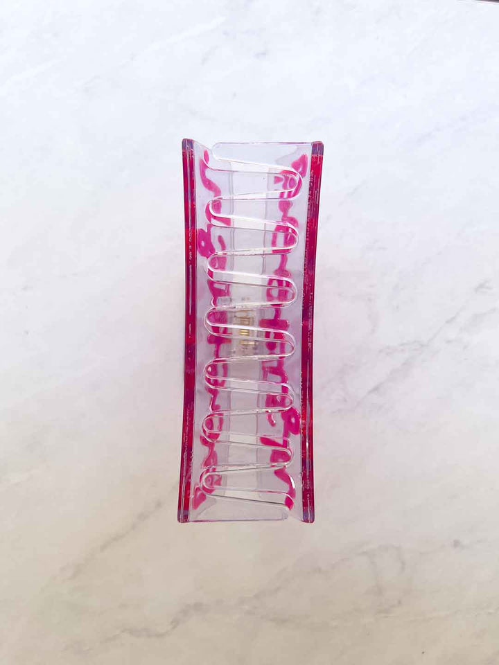 Bookish claw clip featuring transparent acetate material with &