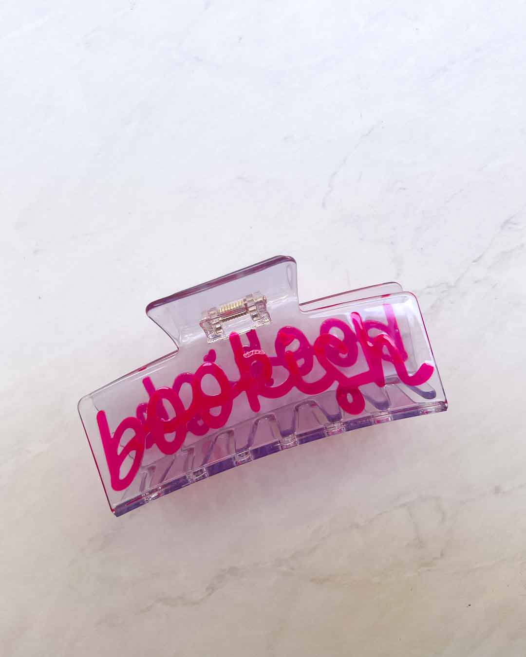 Bookish hair accessory for readers featuring &