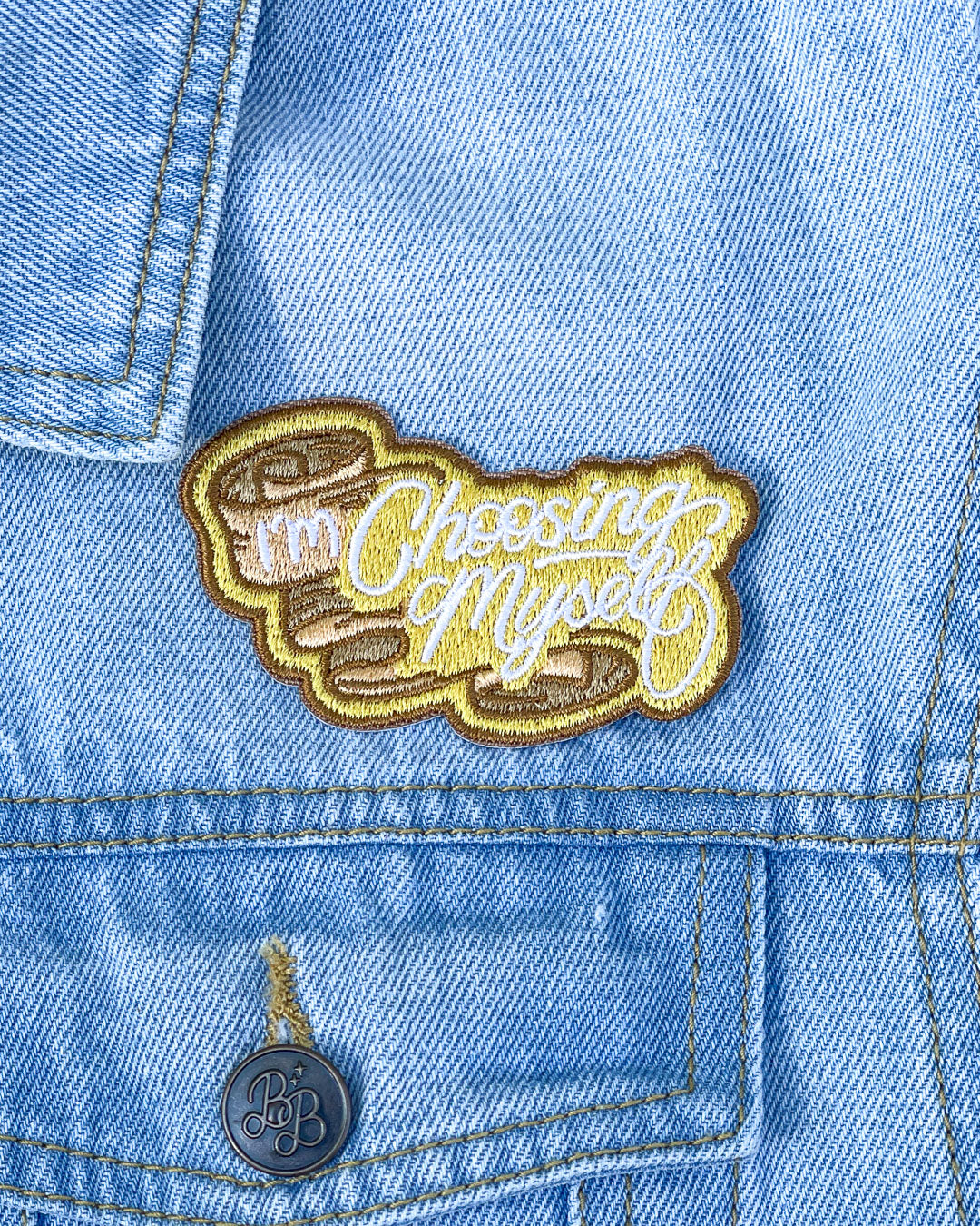 Gild patch featuring a gold patch with the quote &