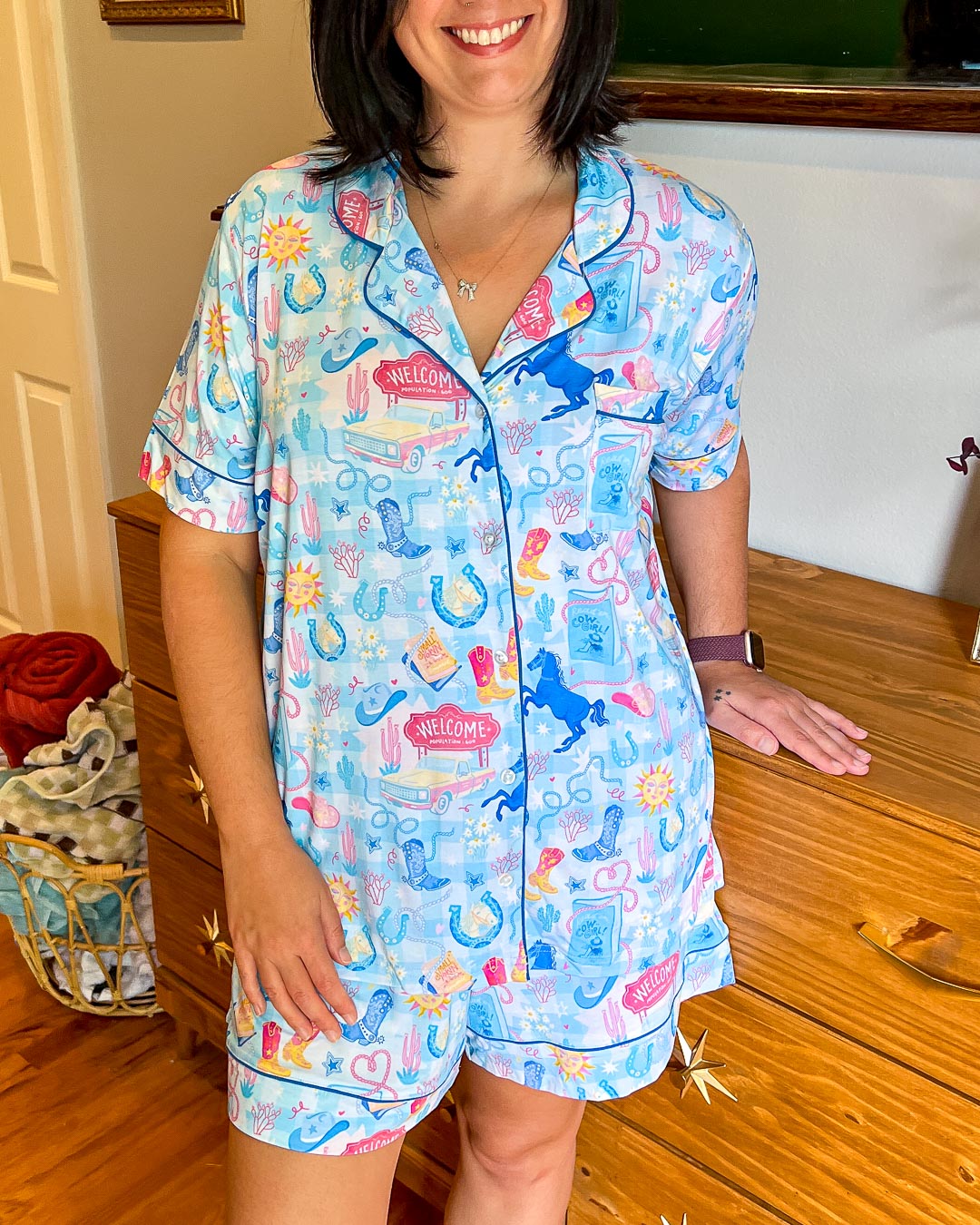 Romance pajamas for cowboy lovers with illustrated designs of horses, lassos, trucks, a welcome sign, and more.