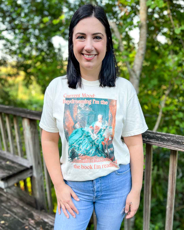 Colorful bookish tee of a fine art painting and the text, &
