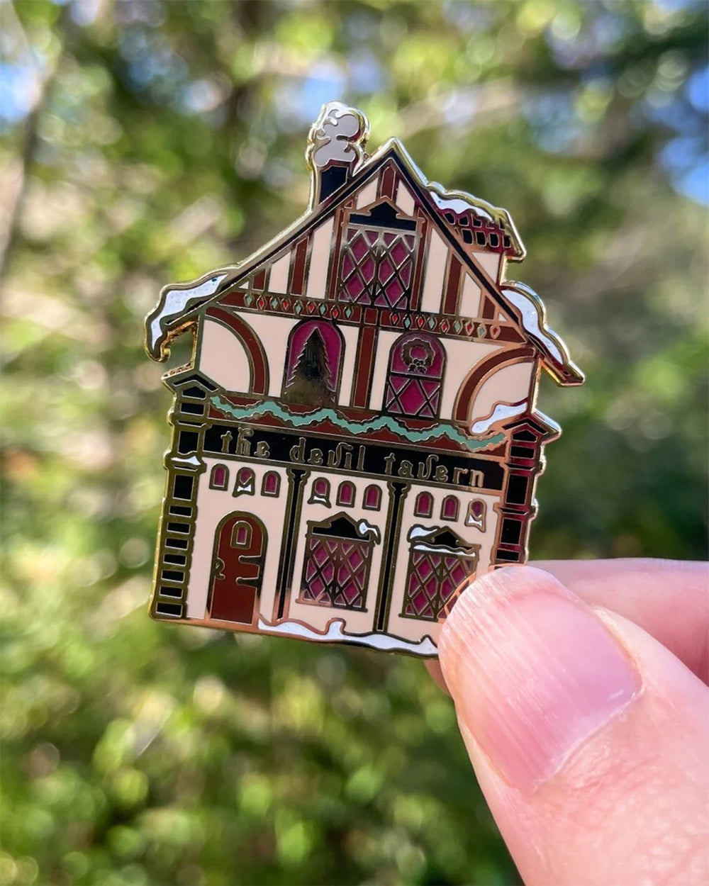 Cassandra Clare enamel pin for Shadowhunters fans featuring a storefront design for The Devil Tavern.