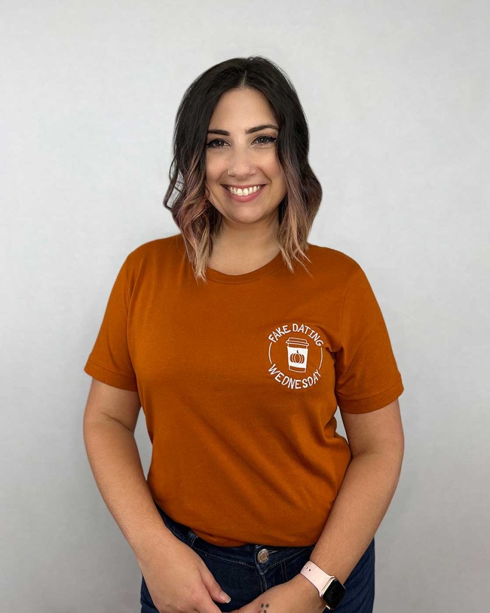 Ali Hazelwood shirt for Love Hypothesis fans featuring a to-go coffee cup with a pumpkin on it with 'Fake Dating Wednesday' circling it.