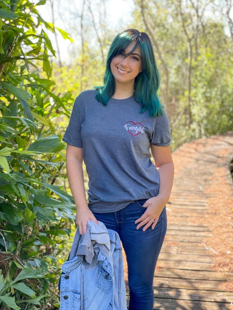 Bookish embroidered shirt for book lovers featuring 'Fangirl' written in a red heart in handwritten script.