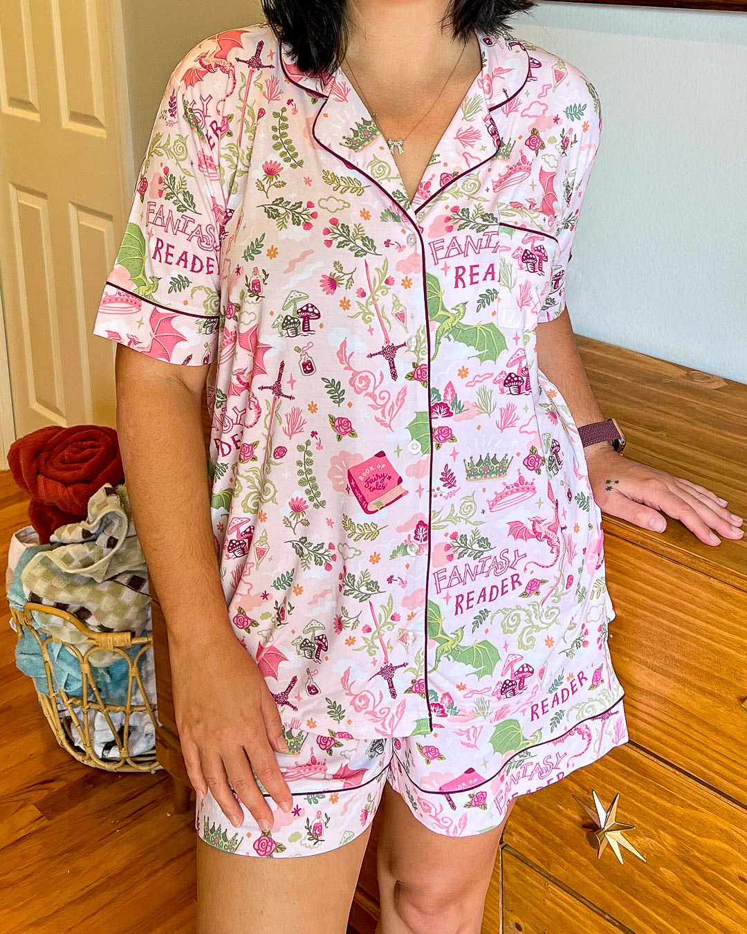 Fantasy pjs set featuring classic symbols of the genre including swords, potions, crowns, mushrooms, and dragons.