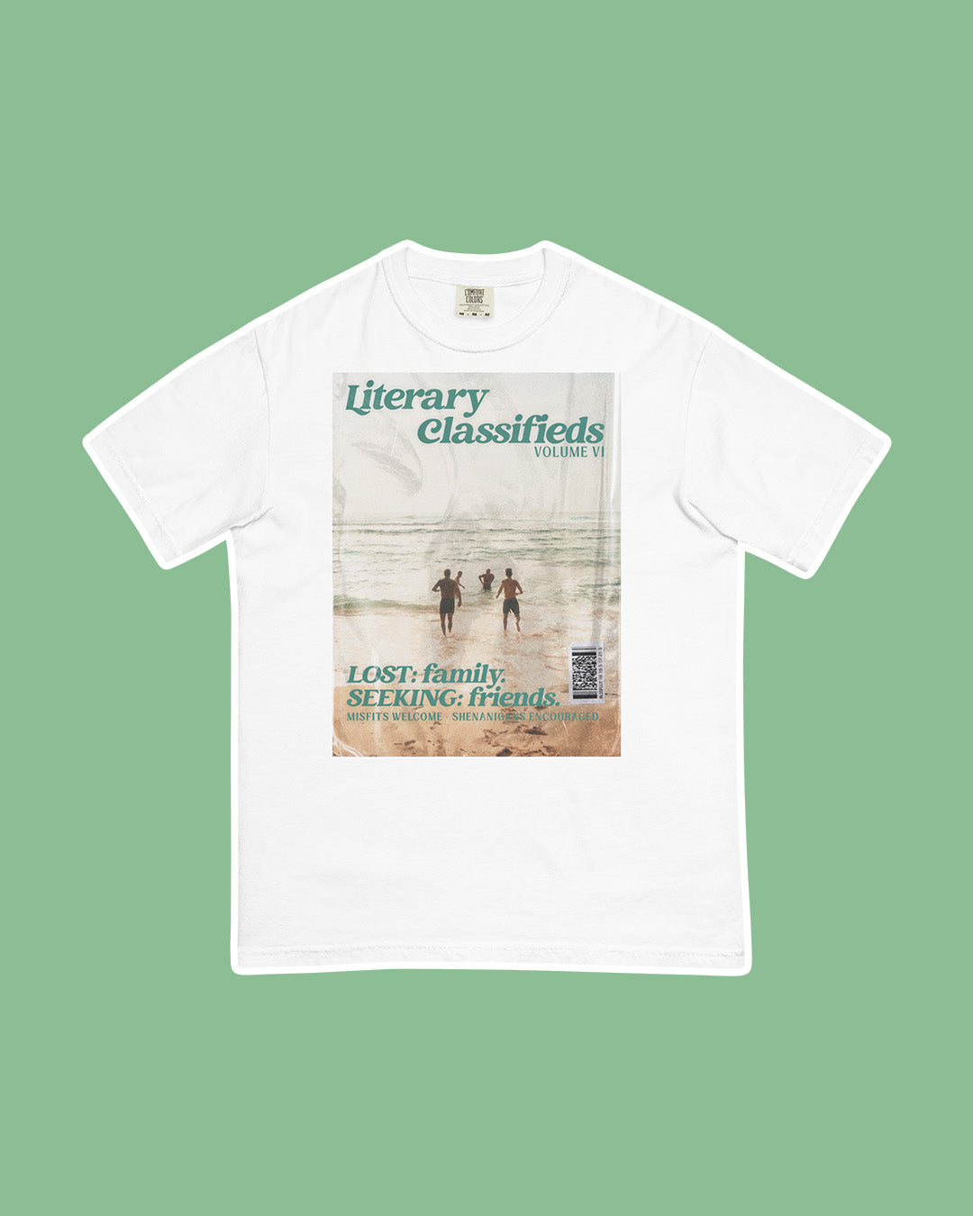 Romance shirt for book lovers featuring the 'Literary Classifieds, Volume VI' for 'LOST: family, SEEKING: friends' inspired by the found family trope.