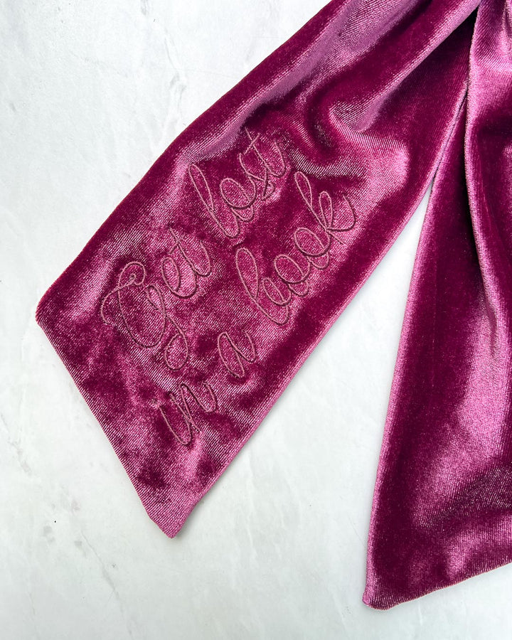 Close up of the embroidered &