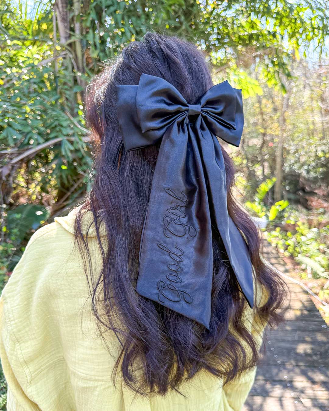 Romance hair bow featuring &