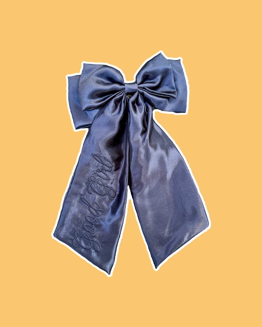 Embroidered satin bow for romance fans with the text 'Good Girl' in a beautiful black color.