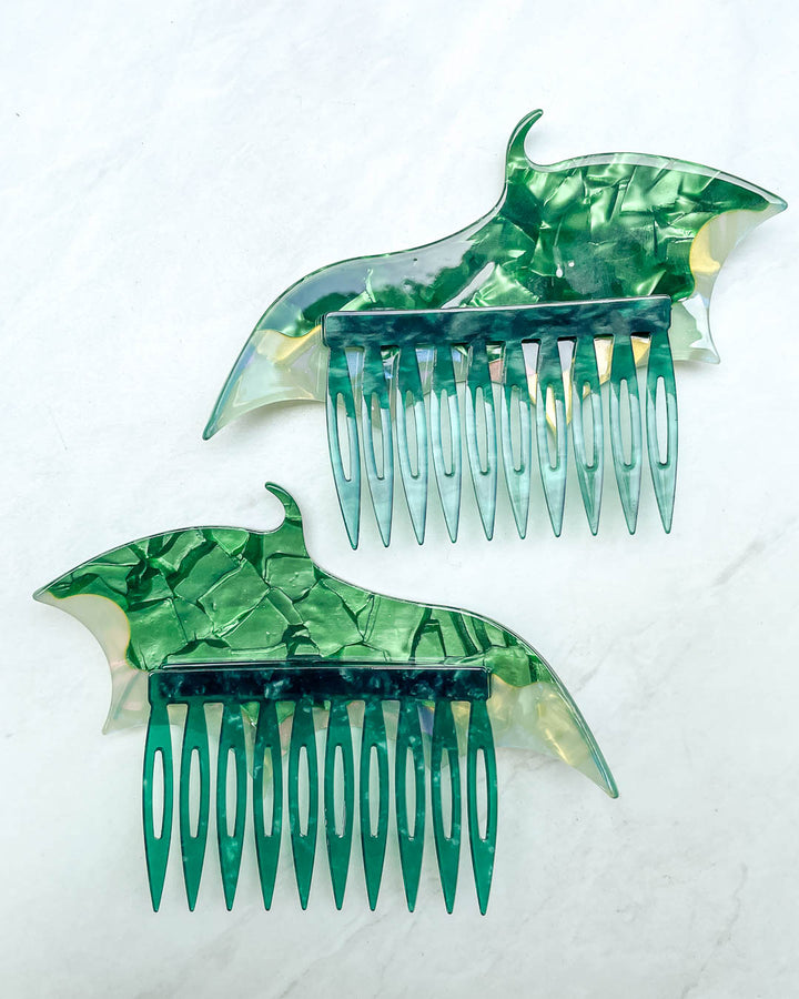 Back of the dragon wing hair accessories featuring a set of green hair combs and a pearlescent color.