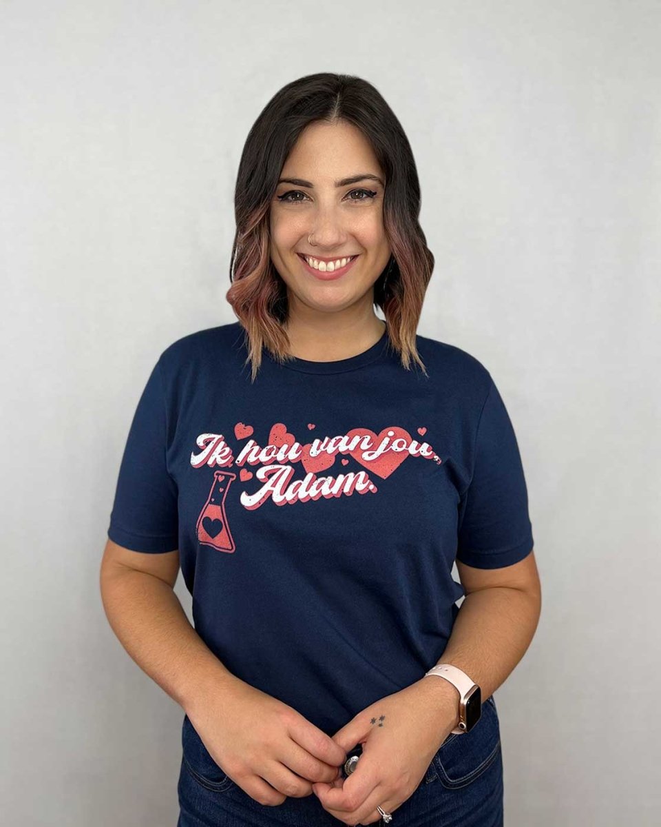 The Love Hypothesis t-shirt featuring hearts and a beaker with the quote &