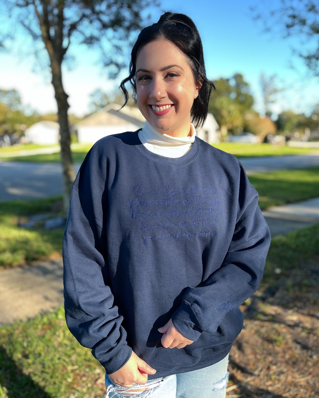 Navy Sacred Stones sweatshirt with the quote &