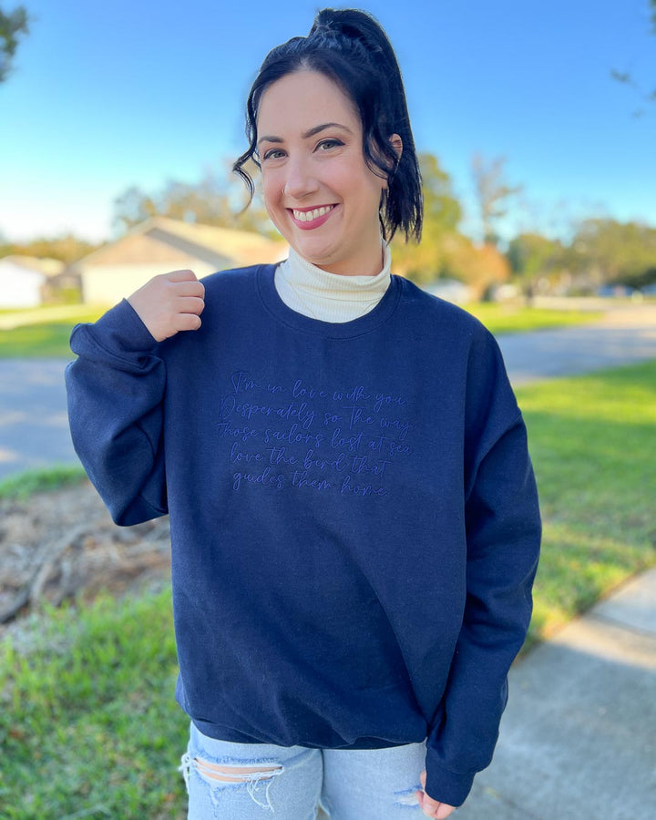 Navy bookish sweatshirt for A Dawn of Onyx fans embroidered with the quote &