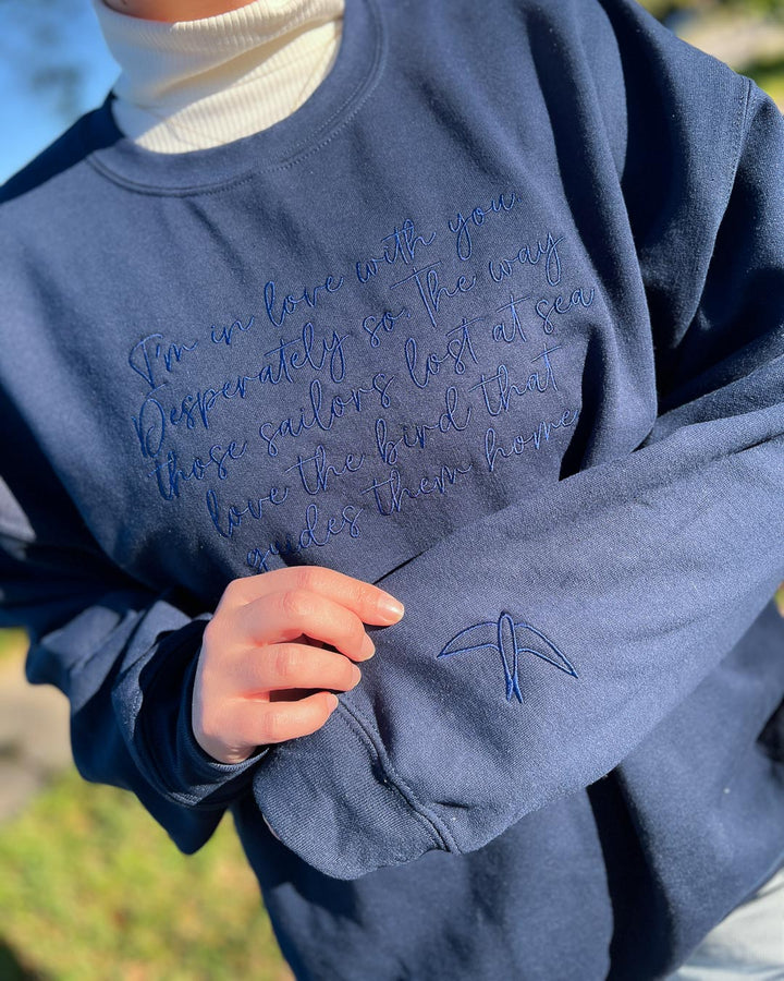 Kate Golden sweatshirt embroidered with the quote, &
