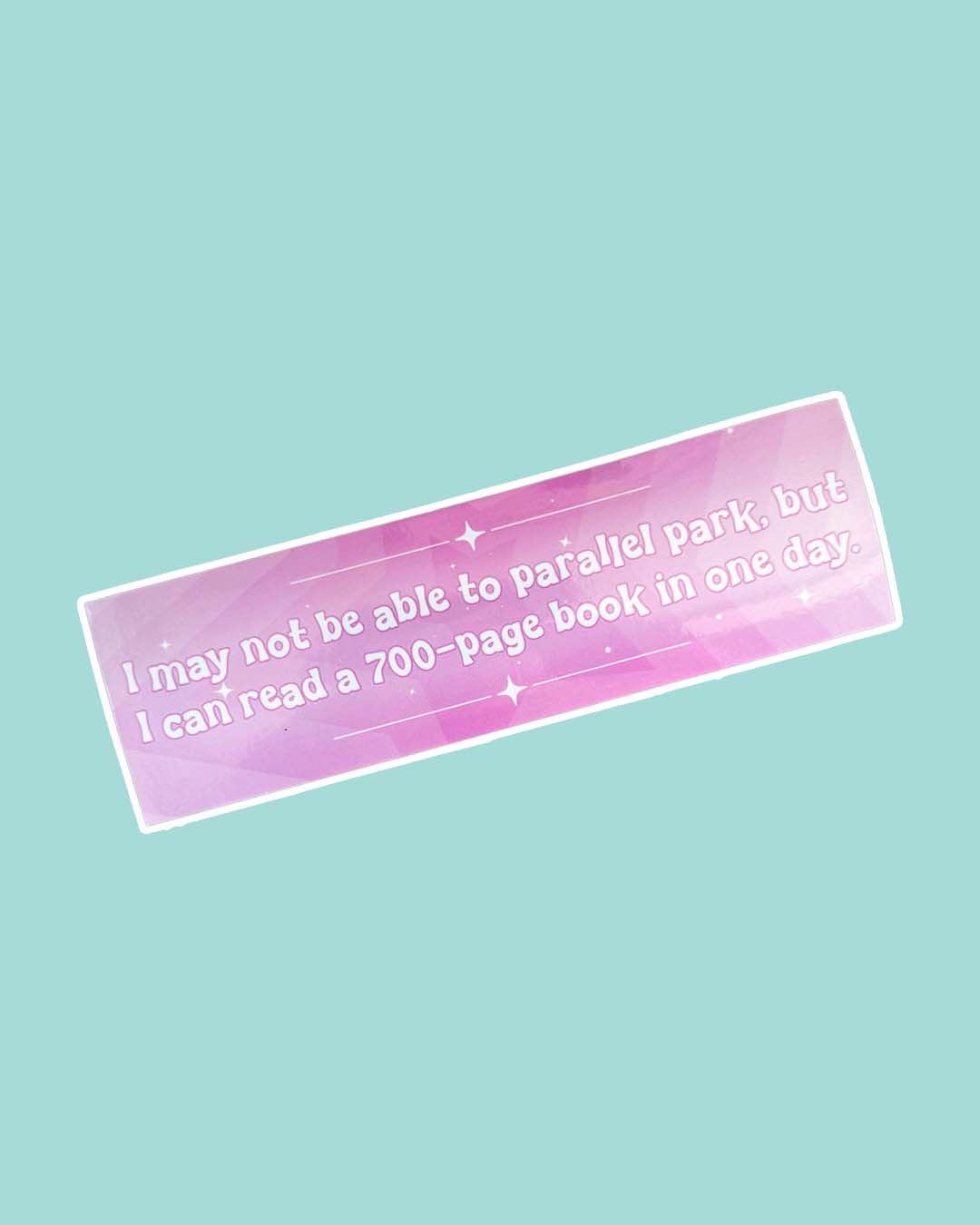 Pink bookish bumper sticker featuring the line, 'I may not be able to parallel park, but I can read a 700-page book in one day.'