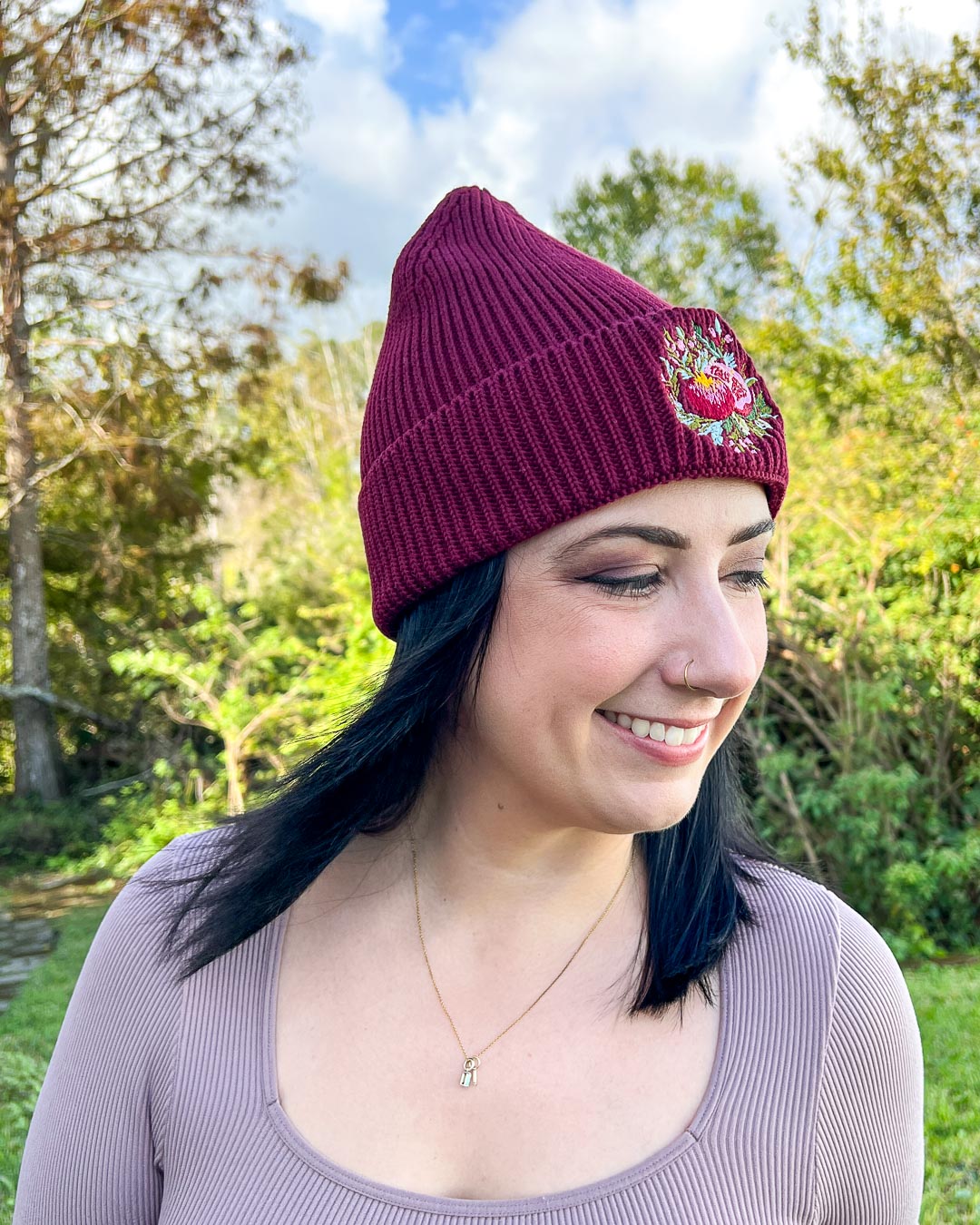 Pomegranate beanie for myth fans featuring an embroidered pomegranate.