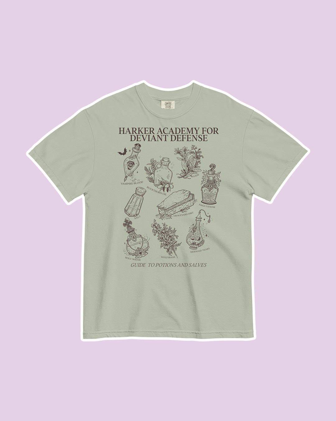 Light green t-shirt on a purple background featuring the text "Harker Academy for Deviant Defense" at the top with a number of line illustrated potion bottles and flora below it, labelled as a "Guide to Potions and Salves."