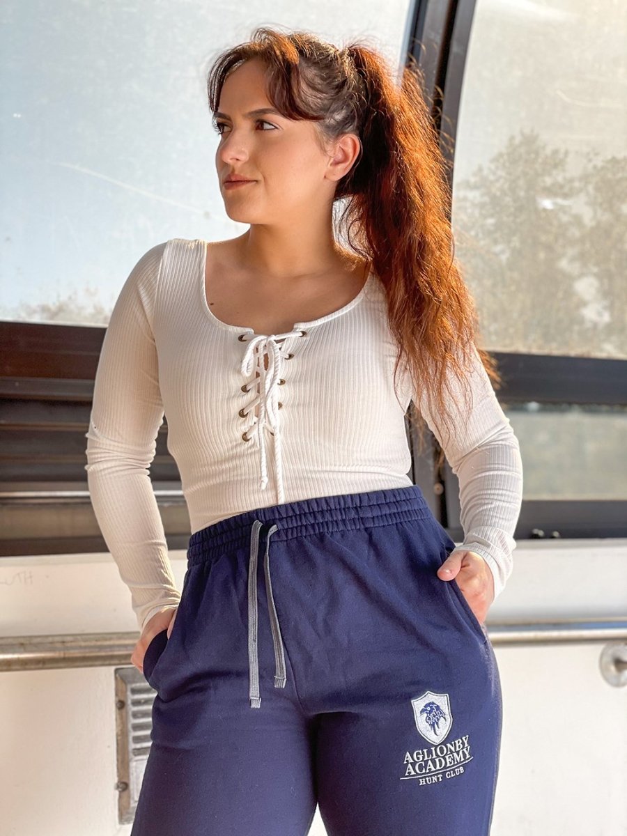 Raven Cycle sweatpants featuring a raven in a shield with the title &