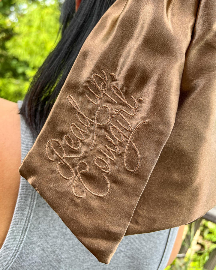 Cowboy hair bow featuring &