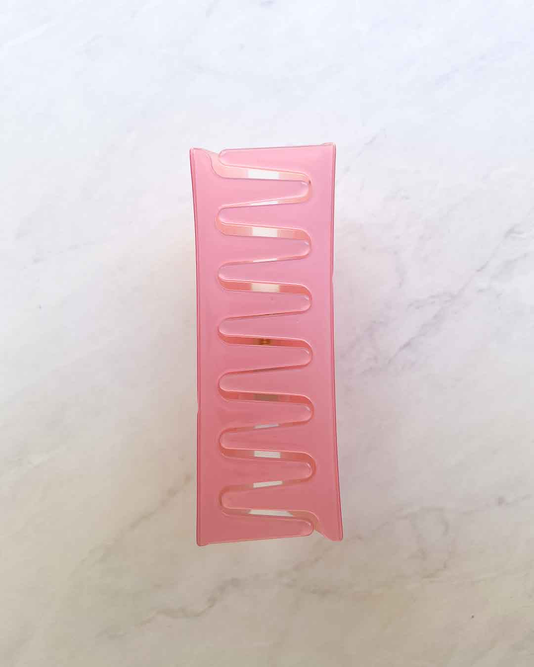 Romance claw clip featuring pink acetate material with &