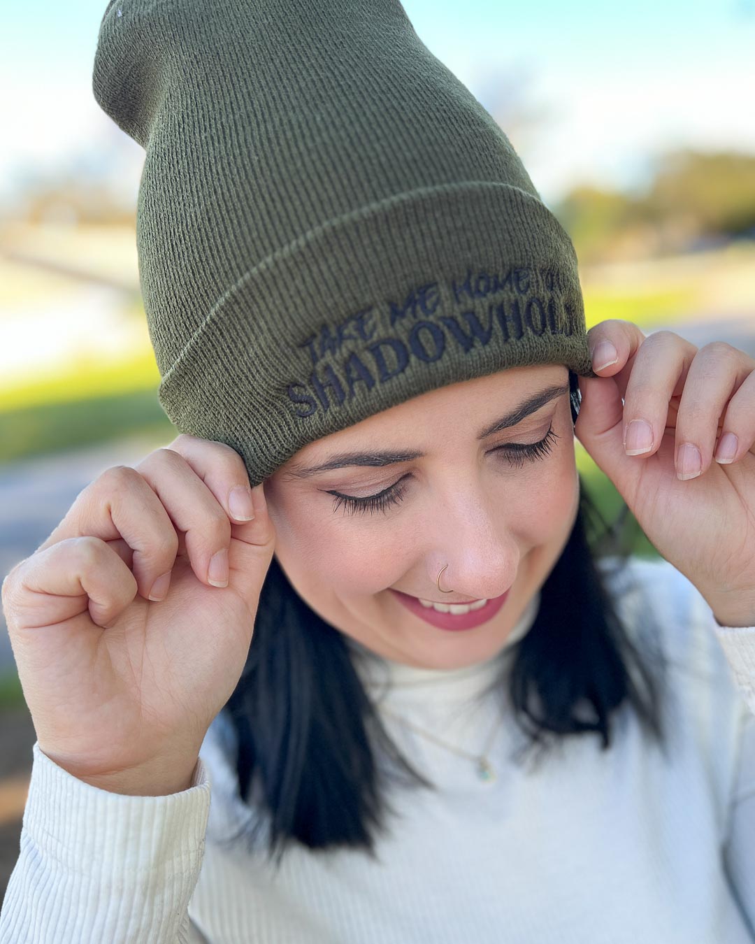 The Sacred Stones beanie designed with the text &