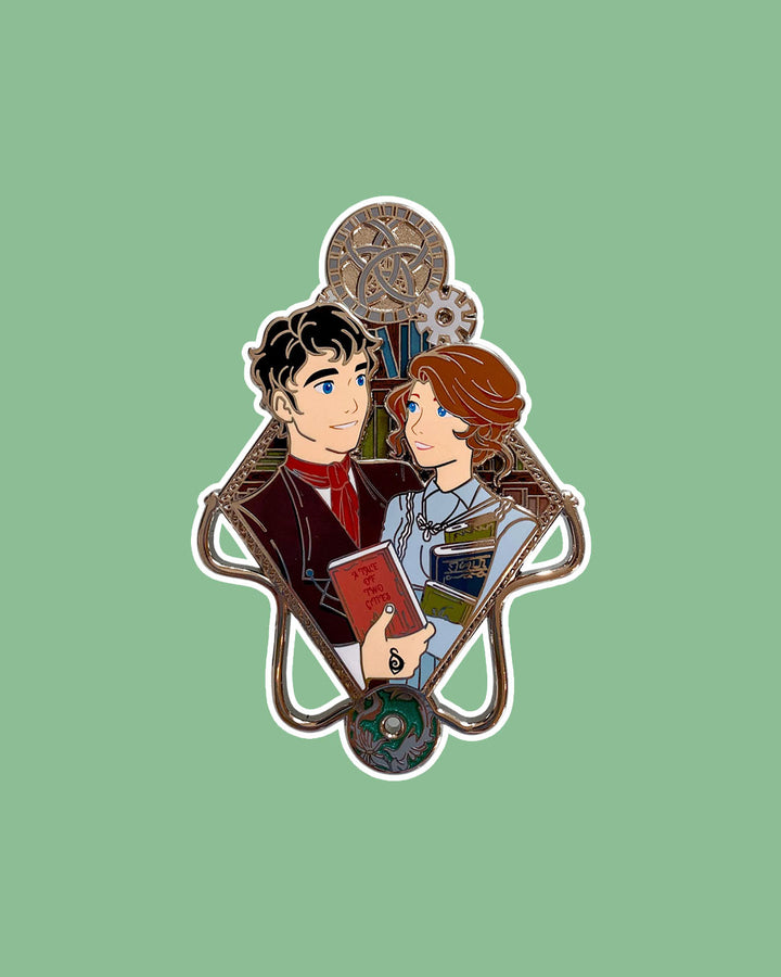 Shadowhunters enamel pin featuring Will and Tessa with a library background and both of them carrying books.