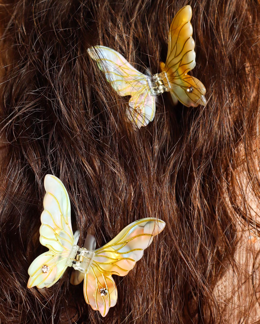 Fantasy mini fairy wing hair claw clips in gold with gems and etchings.