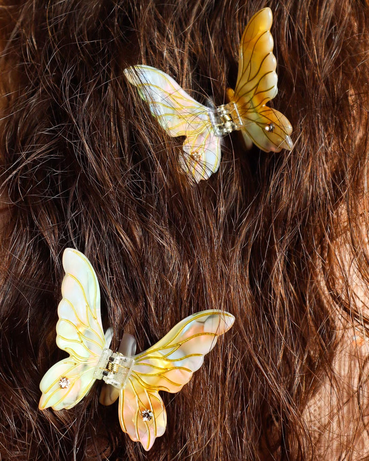 Fantasy mini fairy wing hair claw clips in gold with gems and etchings.