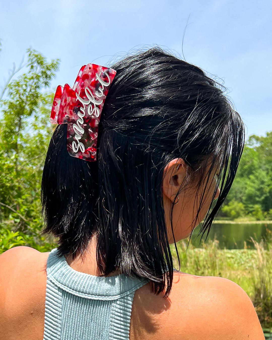 Bookish hair accessory with red, pink, and transparent details for romance readers with &