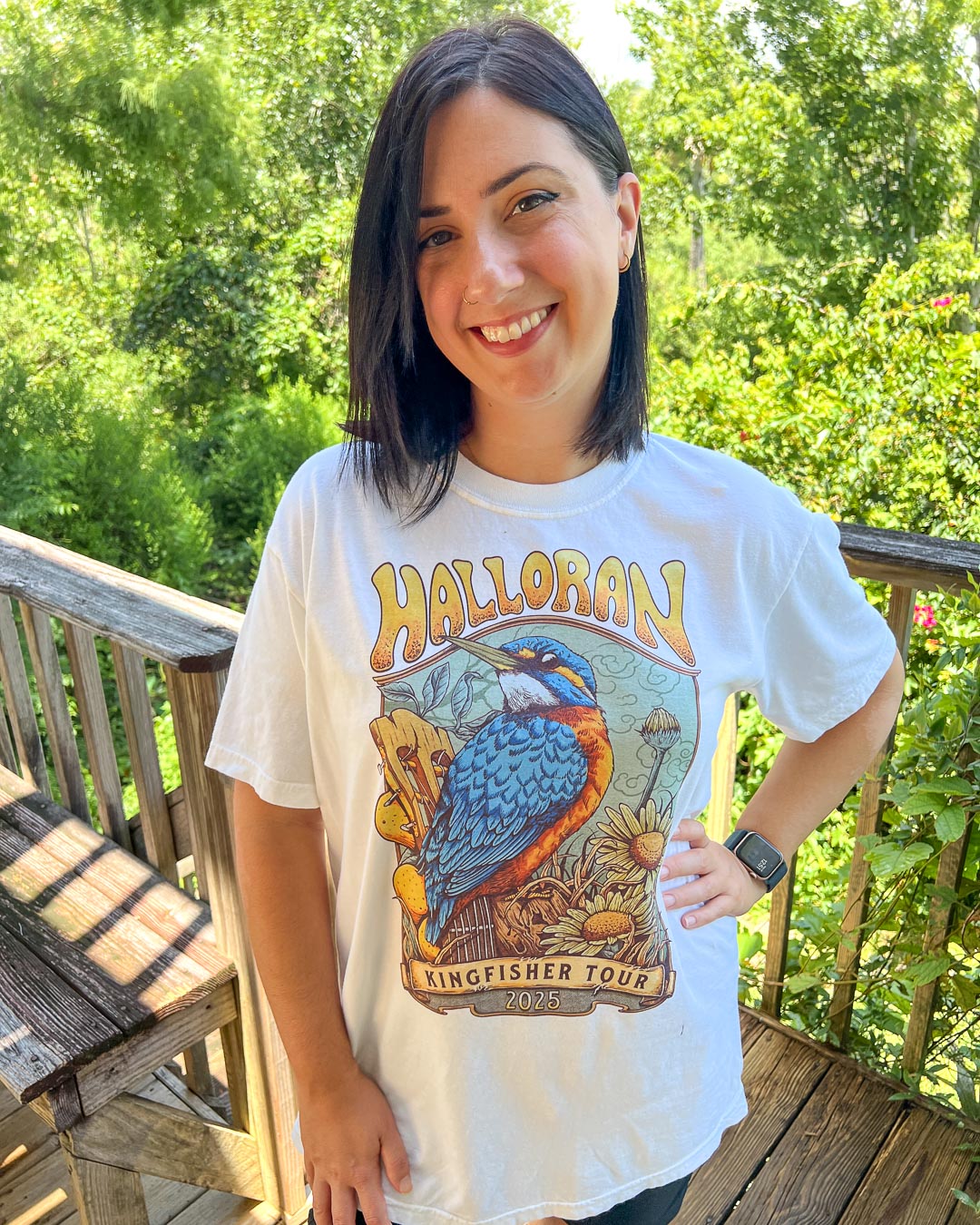 White Kate Golden t-shirt featuring a kingfisher perched on a guitar surrounded by wildlife with the text &