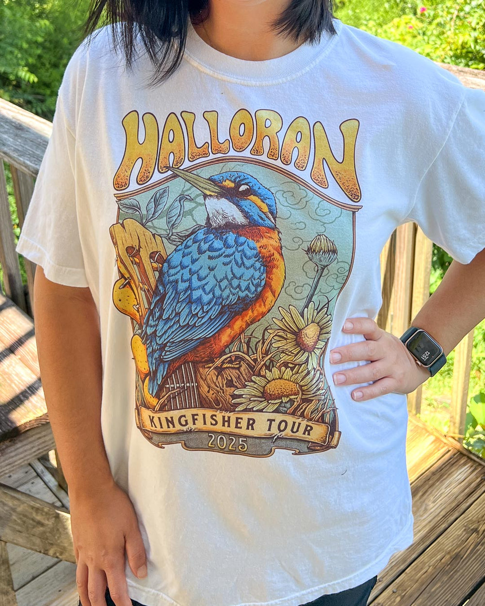 Front of the Kate Golden shirt for If Not For My Baby fans featuring a poster design for the Kingfisher Tour with a kingfisher perched on a guitar and daisies around it on a white tee.