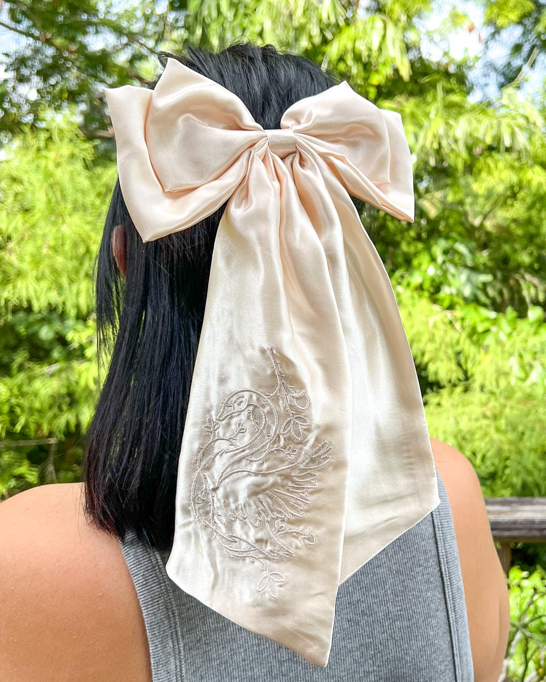 Tenderly I Am Devoured hair bow made with ivory satin and embroidered elements.