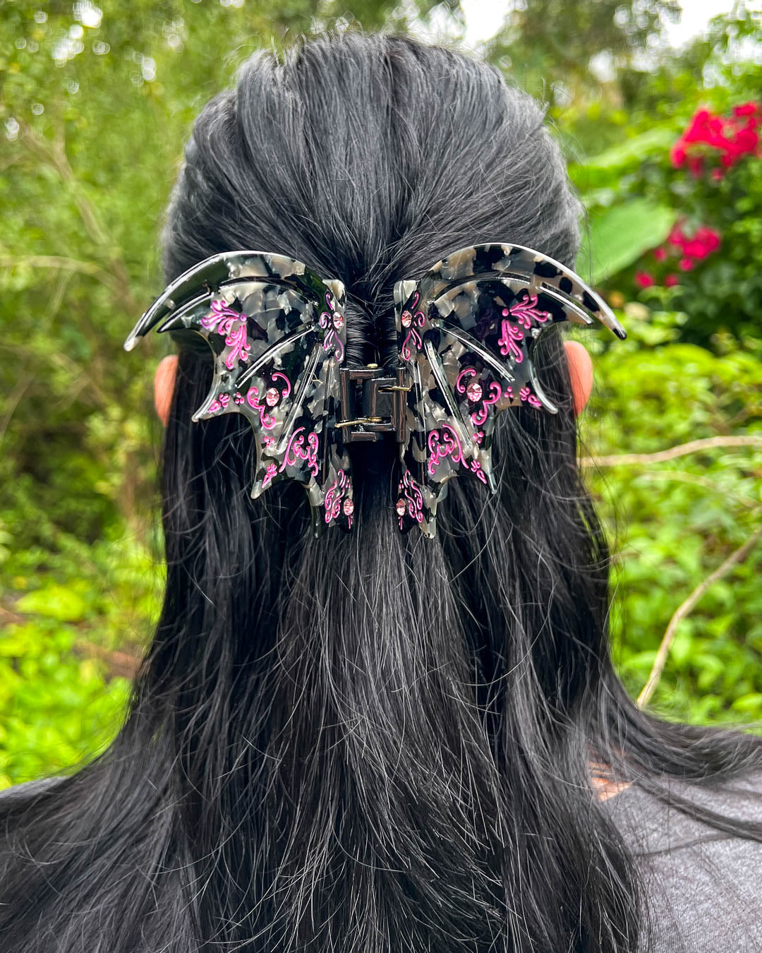 Violet A Court of Thorns and Roses hair accessory with purple gem embellishments and etching details.