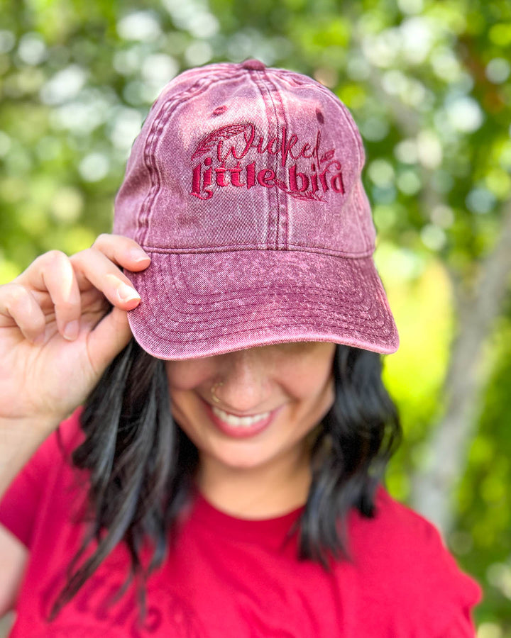 A Dawn of Onyx baseball cap with the nickname &