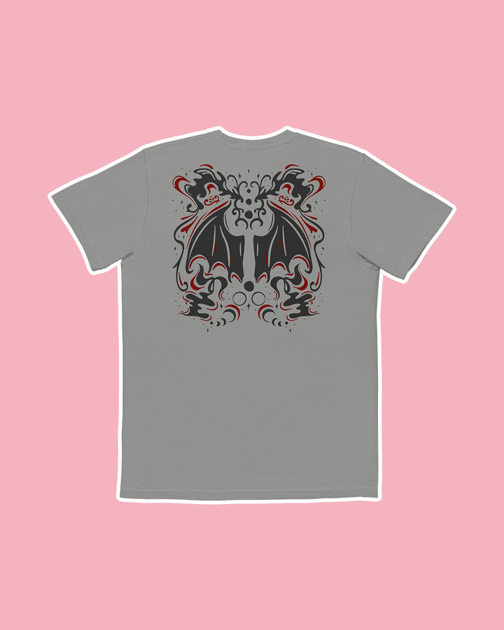 Back of the Serpent &amp; the Wings of Night pocket tee featuring the red and black wing design with swirls and crescents for Carissa Broadbent fans.