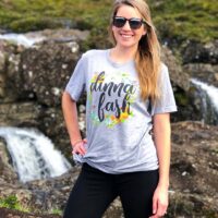 person wearing grey dinna fash boyfriend tee outside in scotland